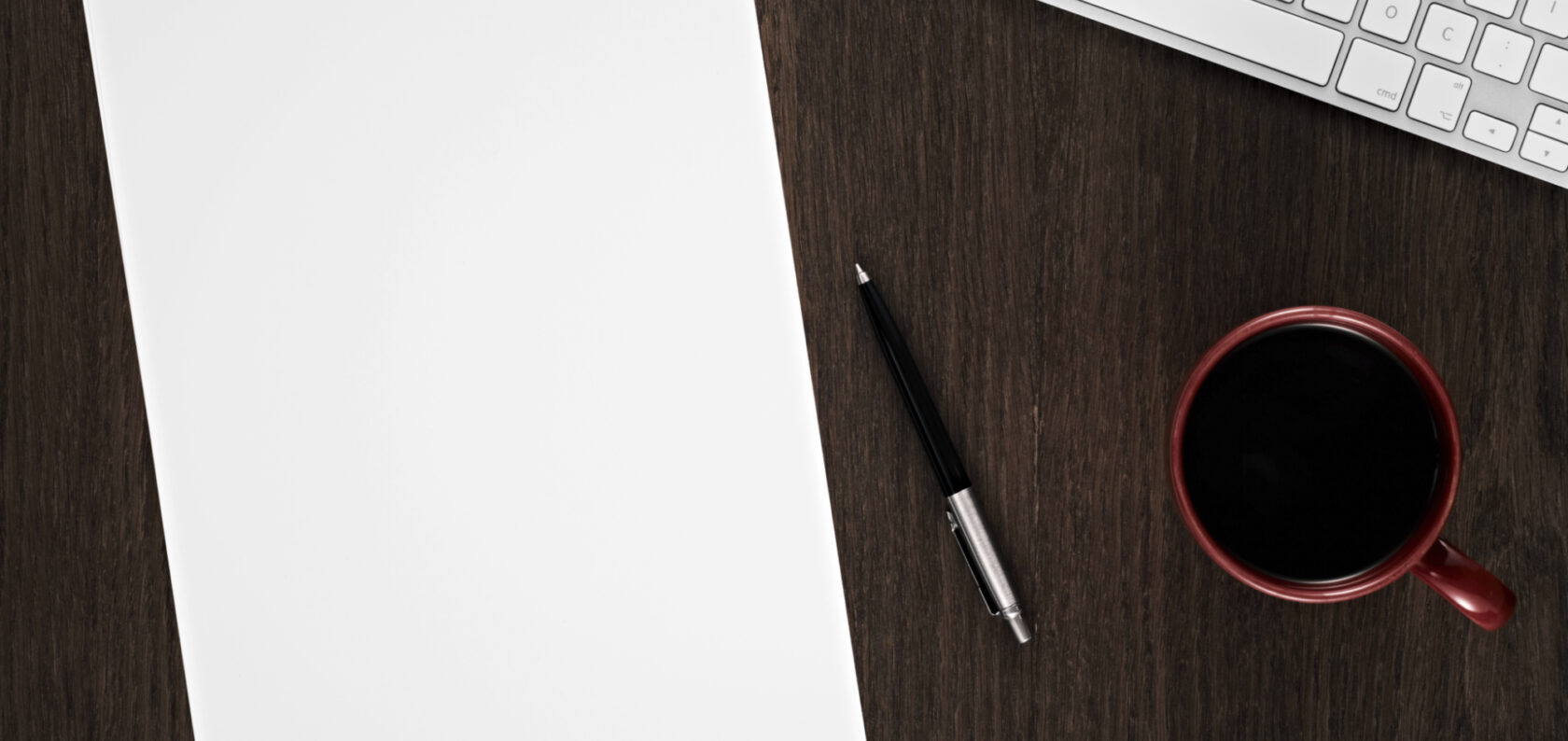 Announcement, News Image - Desk with coffee, pen, paper, keyboard